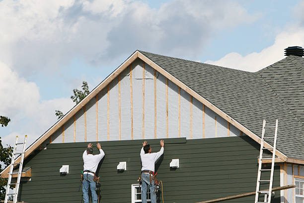 Professional Siding technician working in Simsbury, CT